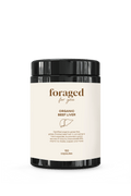 Container of 'foraged for you' organic beef liver capsules on a green background