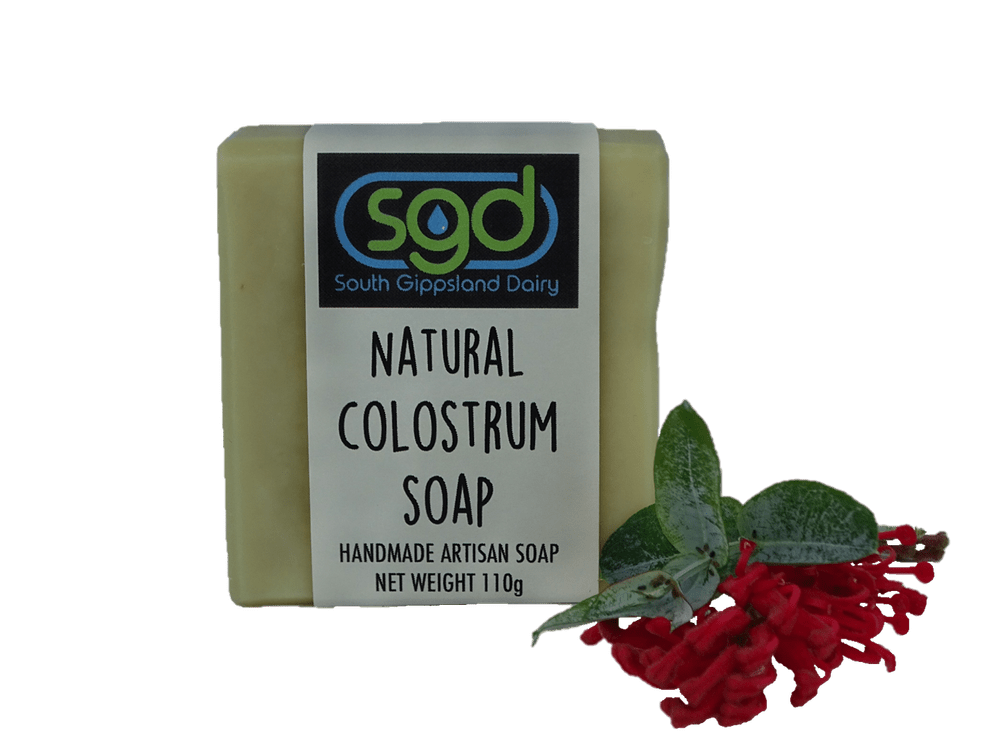 Bar of natural colostrum soap with 'South Gippsland Dairy' branding on a green background.